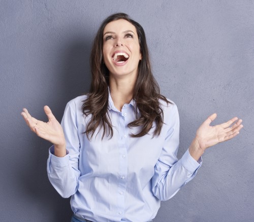 Teacher celebrating that she can finally teach instead of grading papers!